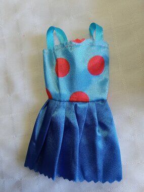 D - 3 mini Barbie dresses in various colors
